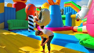 Worlds Largest Bounce House Game Of FLIP [upl. by Chloette]